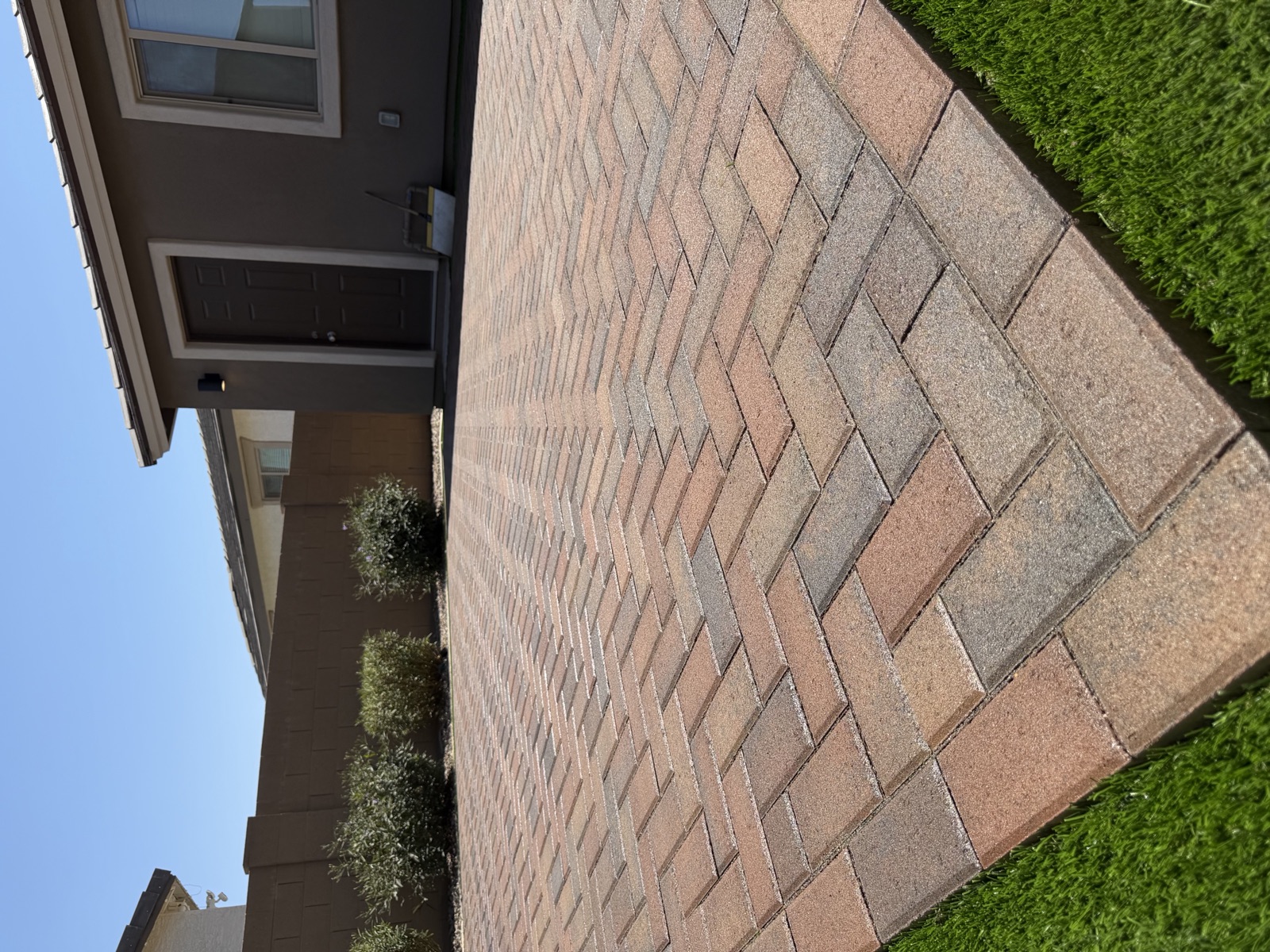 Sealed herringbone brick paver patio at a Scottsdale AZ home — Go Go Gloss